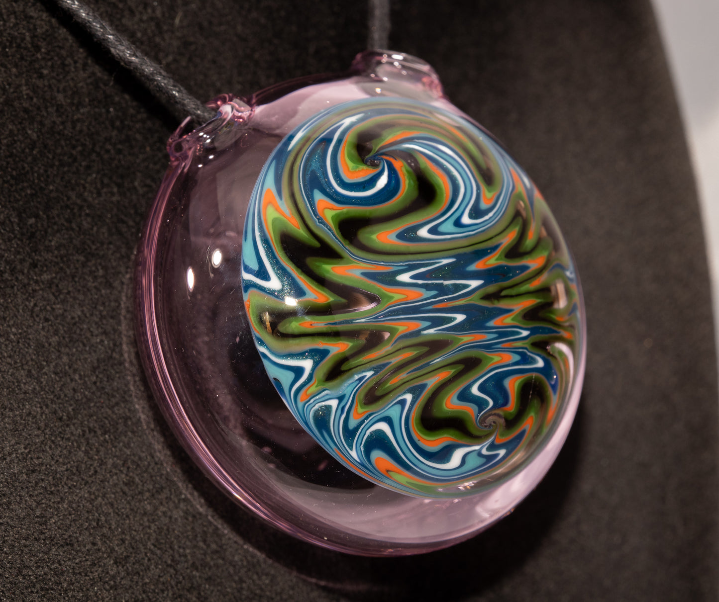 Wigwag Glass Pendant | Hollow Disk Jewelry | Hand-Twisted Art Glass Necklace | Wearable Glass Sculpture